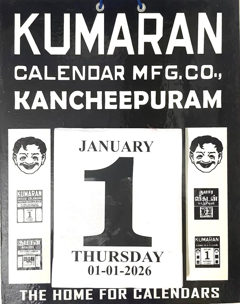 Kumaran Office Calendar by Kumaran Calendar Mfg. Co., Kancheepuram, black cover with a tear-off sheet showing 1 January 2026